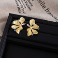 Elegant French Gold Alloy Zircon Floral Stud Earrings Luxury Textured Flower Statement Earrings view 3