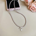Faux Pearl Beaded Rose Pendant Necklace European Minimalist Round Geometric Light Luxury Collarbone Chain view 4