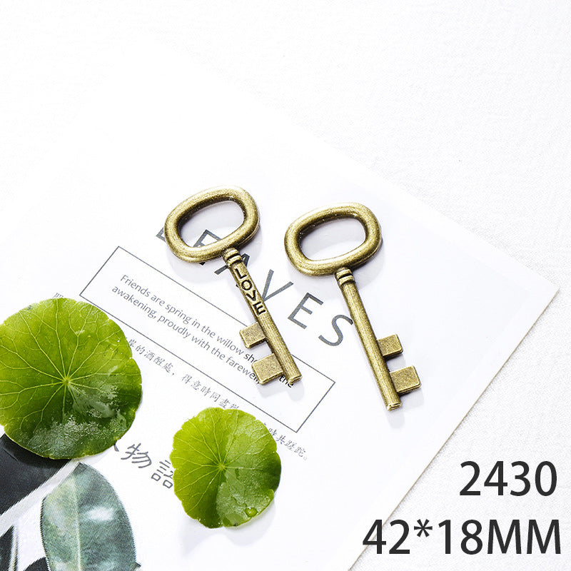 Vintage Double-Sided Alloy Key Charm Pendant for DIY Jewelry