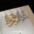 Light Luxury Irregular Metal Matte Sequin Tassel Drop Earrings With Geometric Round Design view 2