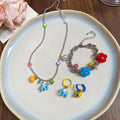 Stainless Steel Flower Pearl Necklace And Bracelet Jewelry Set With Enamel Elephant Pumpkin Charm view 3