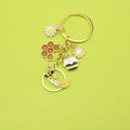 Zinc Alloy Daisy Bee Keychain For Car Bag Charm view 1