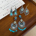 Vintage Ethnic Alloy Drop Earrings With Hollow Leaf Tassel And Oval Turquoise Geometric Pendant view 3