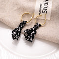 Vintage Leopard Print Fabric Bowknot Gold Alloy Hoop Drop Earrings Elegant Hong Kong Style Luxury Earrings view 3