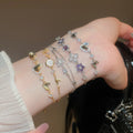 Light Luxury Zircon Heart Hollow Flower Oval Pendant Adjustable Bangle view 1