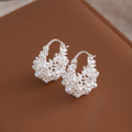 Elegant Korean Style 3D Hollow Pearl Rhinestone Hoop Stud Clip Light Luxury Fashion Earrings view 3