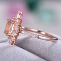Rose Gold Tone Oval Halo Ring With Peach Center Stone view 5