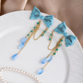 Elegant Blue Enamel Bowknot Waterdrop Tassel Alloy Chain Beach Vacation Long Stud Drop Earrings view 2