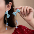 Elegant Blue Enamel Bowknot Waterdrop Tassel Alloy Chain Beach Vacation Long Stud Drop Earrings view 1