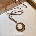 Vintage Ethnic Resin Round Pendant Sweater Necklace With Wood Beads Geometric Minimalist Design view 4