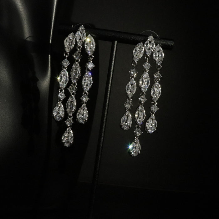 Light Luxury Copper Zircon Oval Teardrop Tassel Drop Earrings With Silver Pins