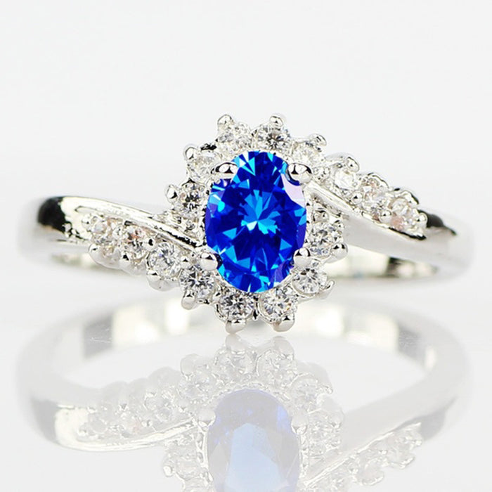 Silver-Tone Oval Crystal Halo Ring In Nine Vivid Colors