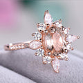 Rose Gold Tone Oval Halo Ring With Peach Center Stone view 3