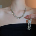 Light Luxury Metal Teardrop Rhinestone Tassel Jewelry Set With Necklace Bracelet And Ear Hooks view 2