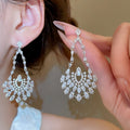 Copper Zircon Hollow Teardrop Flower Pendant Drop Earrings For Women Light Luxury Style view 1