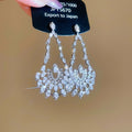 Copper Zircon Hollow Teardrop Flower Pendant Drop Earrings For Women Light Luxury Style view 2