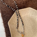 Light Luxury Alloy Black White Beaded Geometric Round Pendant Necklace For Women view 3