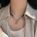 Light Luxury Alloy Black White Beaded Geometric Round Pendant Necklace For Women view 2