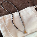 Light Luxury Alloy Black White Beaded Geometric Round Pendant Necklace For Women view 1