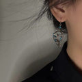 Light Luxury Alloy Phoenix Tassel Drop Earrings With Enamel Geometric Hollow Round Design view 3