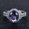 Silver Tone Oval Color Stone Halo Ring with Clear Stone Accents view 2