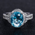 Silver Tone Oval Color Stone Halo Ring with Clear Stone Accents view 6