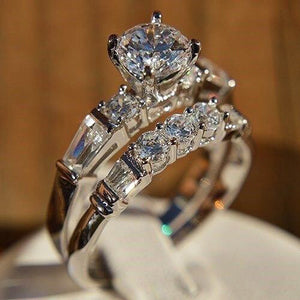 Round Solitaire And Three-Stone Band Two-Ring Set In Silver Tone