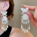 Elegant Alloy Hollow Butterfly Flower Teardrop Tassel Drop Earrings For Women view 1