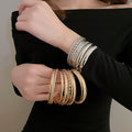 European American Glossy Textured Metal Bangle 8 Piece Fashion Versatile Round Bracelet For Women view 1