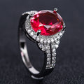 Silver Tone Oval Color Stone Halo Ring with Clear Stone Accents view 1