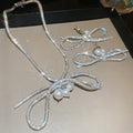 Light Luxury Faux Pearl Bow Rhinestone Pendant Necklace Ear Clip Jewelry Set For Women view 3