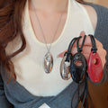 Light Luxury Leather Geometric Oval Pendant Sweater Necklace Minimalist Clavicle Chain view 1