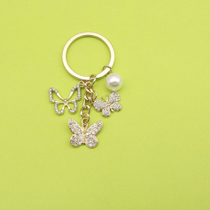 Zinc Alloy Rhinestone Butterfly Keychain With Pearl Bag Charm