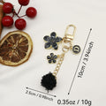 Metal Flower Letter Pom Pom Keychain For Phone Bag Charm view 2