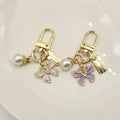 Zinc Alloy Cartoon Butterfly Letter Pearl Keychain Bag Charm Gift view 3
