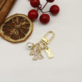 Zinc Alloy Cartoon Butterfly Letter Pearl Keychain Bag Charm Gift view 6