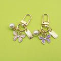 Zinc Alloy Cartoon Butterfly Letter Pearl Keychain Bag Charm Gift view 1