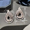 Luxury Urban Women's Stud Earrings With Hollow Teardrop Design, Lightweight Fashion Jewelry view 4