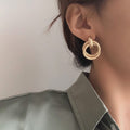 Light Luxury Matte Metal Geometric Circle Stud Earrings For Women With Steel Posts view 2
