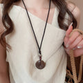 Ethnic Style Braided Cord Sweater Necklace With Hollow Wood Ginkgo Alloy Pendant view 3