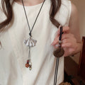 Ethnic Style Braided Cord Sweater Necklace With Hollow Wood Ginkgo Alloy Pendant view 1