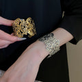 Light Luxury Metal Hollow Flower Open Round Bangle For Women European Style Jewelry view 1