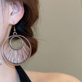 Vintage Ethnic Alloy Geometric Round Hollow Pendant Woven Hook Drop Earrings view 4