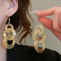 European Style Metal Round Hollow Wrap Tassel Pendant Drop Earrings For Women view 4