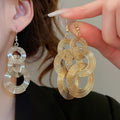 European Style Metal Round Hollow Wrap Tassel Pendant Drop Earrings For Women view 2