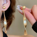 Geometric Ribbon Pearl Drop Earrings With Silver Pins, Twisted Metal Line Fashion Jewelry view 4