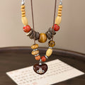 Vintage Mixed Material Wooden Bead Heart Geometric Pendant Long Ethnic Sweater Necklace For Women view 4