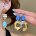 Light Luxury French Retro Acrylic Geometric Round Hollow Contrast Color Stud Earrings view 2