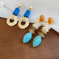 Light Luxury French Retro Acrylic Geometric Round Hollow Contrast Color Stud Earrings view 3