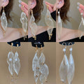 Court Style Faux Pearl Teardrop Tassel Drop Earrings With Silver Pin Grid Pendant Design view 1